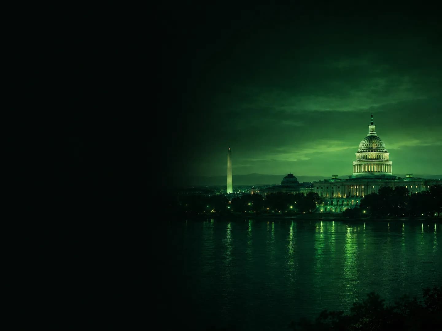 U.S. Capitol and Washington Monument viewed across the water at dusk